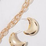 Pretty Little Thing Gold Curved Drop Earrings Photo 3