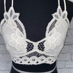 Francesca's Francesca’s lace criss cross back bralette w/4 adjustable straps white sz Med Photo 1