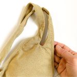 Becca gold metallic deep V neck low-back onepiece Photo 6