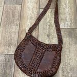 Brown leather purse. Bohemian style Photo 2