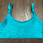 Outdoor Voices  Green Teal shimmer size medium
Sports Bra Photo 0