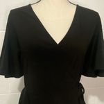 Leith Black Flutter Sleeve Faux Wrap Blouse Photo 1