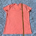 Under Armour  UA Women’s heat gear V neck Short sleeve Tee size Medium Photo 6