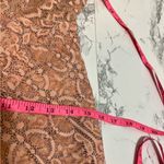 NBD  Revolve Secrets Revealed Lace
Asymmetrical Romper in Dusty Rose Sz XS Photo 8