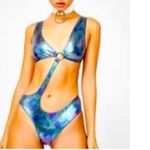 Dolls Kill  | Club Exx | Sick Hypnotic Cut Out Bodysuit Black/Purple Holographic Photo 1