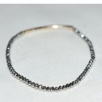 Source Unknown Sparkling Beveled Dichroic Gray Glass Beads Gold Tone Tube 6" Stretch Bracelet Photo 1