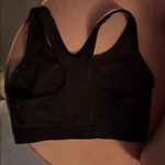 Nike  Women's Classic Dri Fit Black Sports Bra with White Logo Photo 1