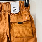 Xersion High-Rise Active Shorts with Pocket - Size Small (7/8) Photo 1