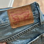 Levi's | Women's 501 Distressed Straight Leg Denim Jeans Photo 2