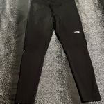 The North Face Womens large leggings with zipper at ankles Photo 0