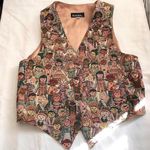 Unique vintage 90s tapestry vest with a funky, multi Photo 0
