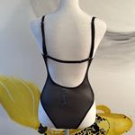Forever 21  lingerie one piece. Lace and mesh.  Size small.  Adjustable straps. Photo 3
