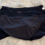 Athleta  Shorts size S inseam 3” waist 30” flat elastic color black small pocket Photo 5