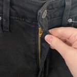 Levi's Levi’s 721 solid black distressed high rise skinny jeans size 27 Photo 4