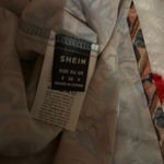 SheIn Chic paisley design. Sleeveless style. Perfect for casual outings. Great dress for festivals, fun, the beach, and vacations. Light and cool fabric. Photo 4