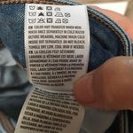 American Eagle  Outfitters midi distressed light wash denim shorts size 4 Photo 3