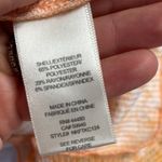 Love, Fire NWT  cropped cardigan and tank set in orange sherbet with ditsy print. Photo 14