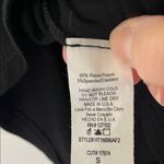 Super Cute Flowy Black Sleeveless Tank Top with Crisscross Detail Photo 2