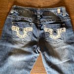 Almost Famous Women's Size 7 Distressed Ripped Lace Trim Low Rise Jeans Photo 3