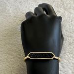 Kinsley Armelle Chic Gold Cuff with Black Accent Photo 1