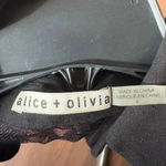 Alice + Olivia  cut sleeve tunic whit mesh details on the back color black size4 Photo 3