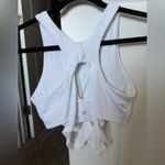 Athleta  Conscious Cut Out Crop Top Crossover Sports Bra D-DD Cups in White Photo 3