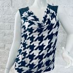 Valerie Stevens Valerie I was size 1XSleeveless   Black and white print blouse   Featuring faux leather with metal dots on the shoulder.   banded waist Photo 0