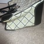 Dooney & Bourke Black and Cream Logo Satchel with blue duck bag charm Photo 11