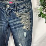 Almost Famous  distressed embroidered skinny jeans 3 Photo 1