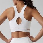 Athleta  Conscious Cut Out Crop Top Crossover Sports Bra D-DD Cups in White Photo 1