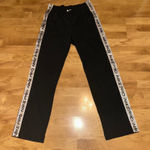 Nike  Pro tear away women's Black  Track Pants Side Logo Stripe Size S BV3350 Photo 0