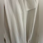 New York & Company Ivory Button Down Tie Neck Bodysuit in EUC Size Extra Small Photo 7