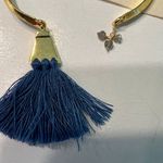 Shiraleah Chicago Gold Bangle Bracelet with Navy Blue Tassel and Charm Detail Photo 2