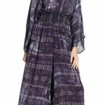 NWOT Dual Nature Flowy and light purple romper with v Photo 0