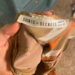 Saints + Secrets Romper Photo 2