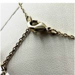 Gold tone and opal T monogram pendant necklace Photo 5