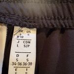 Adidas  track pants white stripes and a slim tapered leg women’s S long Photo 8