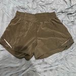 Lululemon  hotty hot 4 inch low rise black size 6 Photo 1