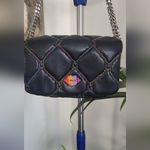 Betsey Johnson Handbag with gold chain detail on strap. Photo 1