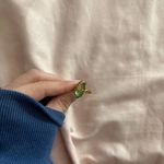 Elegant Gold colored and Green Ring Photo 1