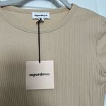 superdown Dana Wrap Mini Dress in Nude Photo 5