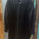 Jaclyn Smith Black‎ leather trenchcoat by  Photo 0