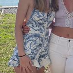 Francesca’s Floral Blue Romper Photo 1