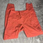 Lululemon  Rise and Flow Pant Mesh Criss Cross Size 4 Orange Coral EUC Photo 5