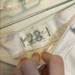 We The Free  FP white jeans with distressing at the knees Photo 6