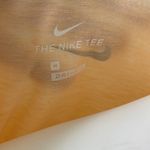 Nike  Women’s Dri-FIT Script-Logo Orange Scoop Neck Training T-Shirt Medium Photo 4