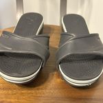 Crocs Women’s  Sandal Black With White Stripe US Size 7 Criss Cross Slip-On Wedge Photo 1