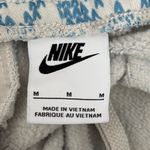 Nike  Sportswear Club Fleece Holiday Sweatpants Blue White Snowflakes Jogger Photo 8