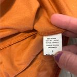 Orange velvet blouse with puffed sleeves and ruched detail # Photo 3