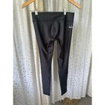 Oiwi Ocean Gear Women's Mid Rise 4 Way Stretch UPF 30+ Compression Leggings XS Black Photo 2